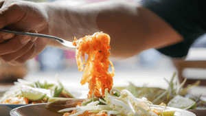 Man with Pad Thai Noodles on Fork
